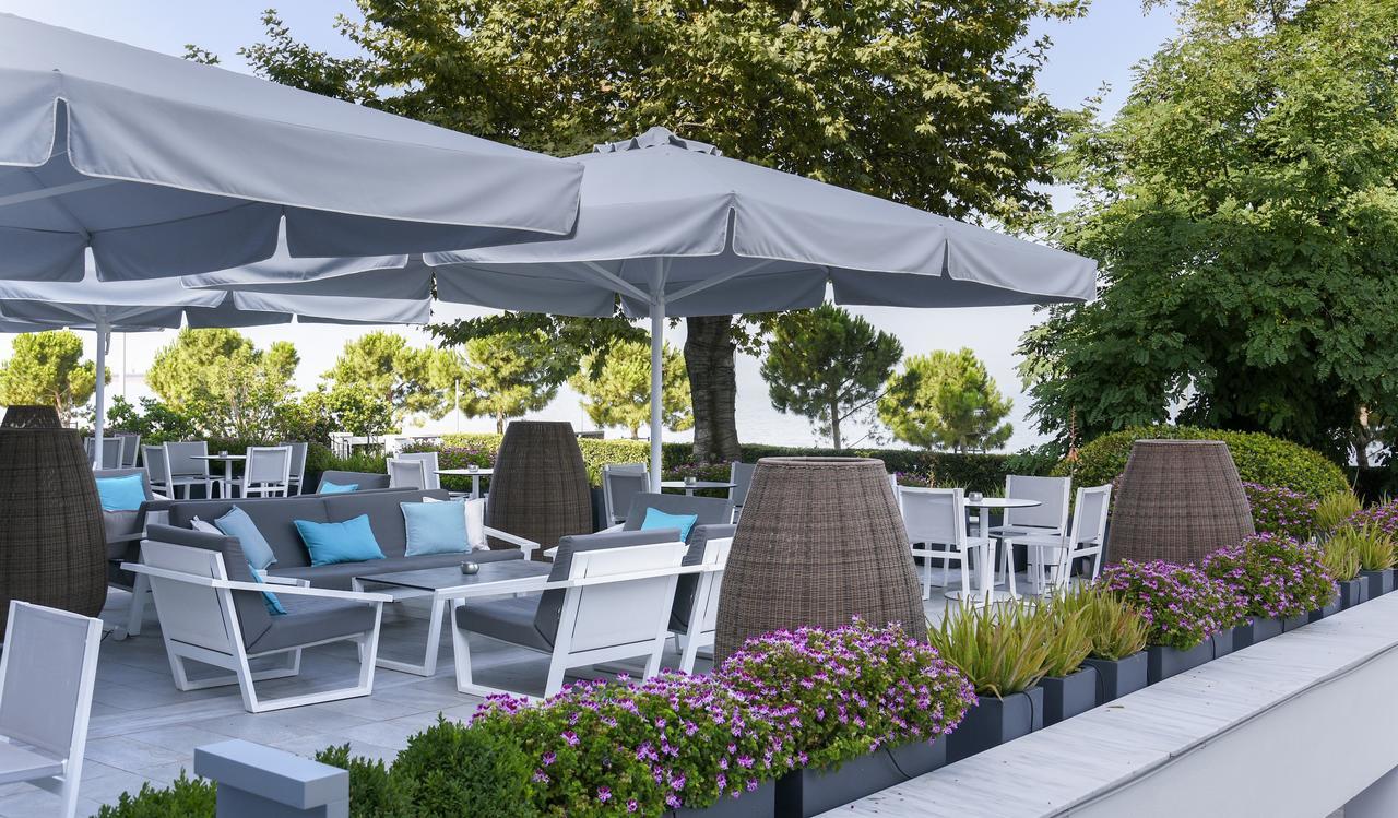 Makedonia Palace Thessaloniki Exterior photo A patio umbrella